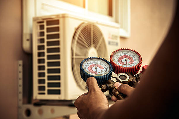 Professional Hvac technician working in Prides Crossing, MA